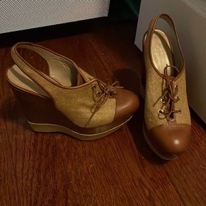 Like new Stuart Weitzman rattan and leather wedges